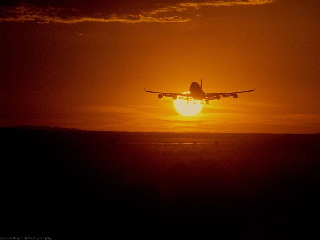 aereo-decollo-tramonto